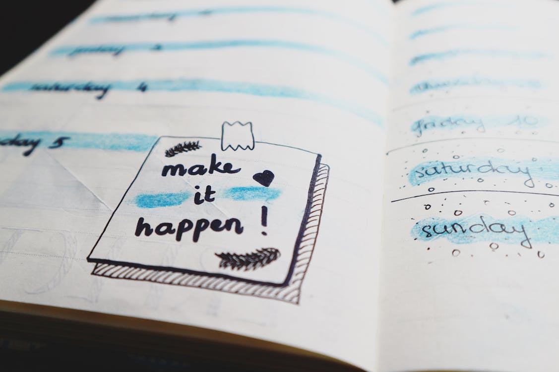 “Make it happen” note on a paper